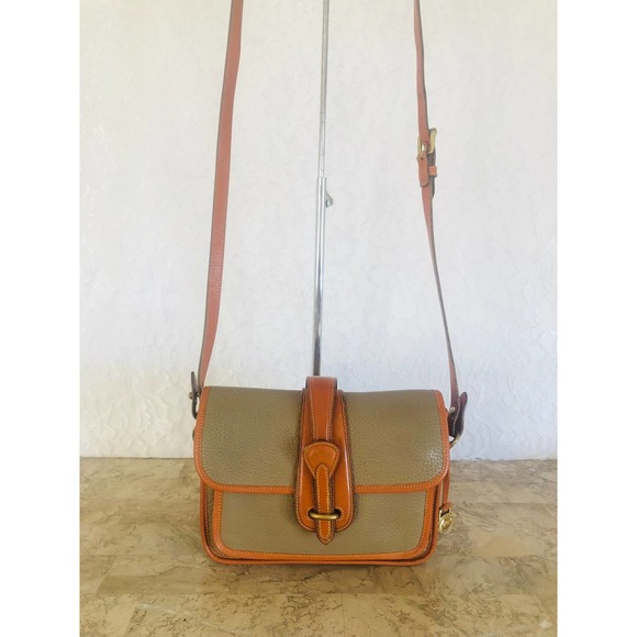 Dooney & Bourke Handbags - DOONEY BOURKE AWL pocket equestrian taupe crossbody/shoulder bag Model P125